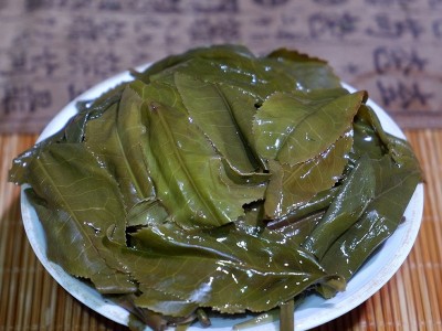 云南普洱茶二号定制普洱茶生茶紧压茶357g茶饼厂家直销定制加工茶图5