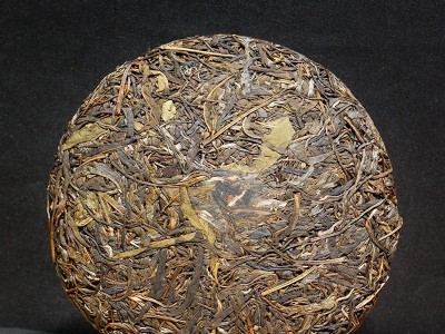 云南普洱茶二号定制普洱茶生茶紧压茶357g茶饼厂家直销定制加工茶图3