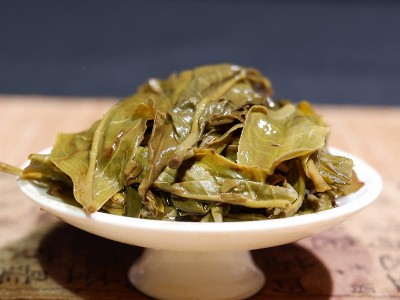 云南普洱茶一号定制普洱茶生茶紧压茶357g茶饼厂家直销定制加工茶图5