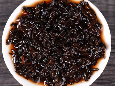 云南勐海2014年七子饼普洱茶熟茶 厂家批发陈年普洱茶饼357g茶叶图4