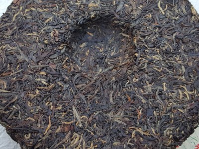 批发云南普洱茶老生茶七子饼红茶叶味道普洱王明前春尖布朗山纯料图5