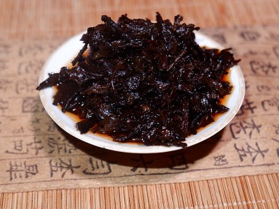原产地批发茶叶云南勐海普洱茶茶树王冰岛普洱熟茶饼357g厂家直销图4